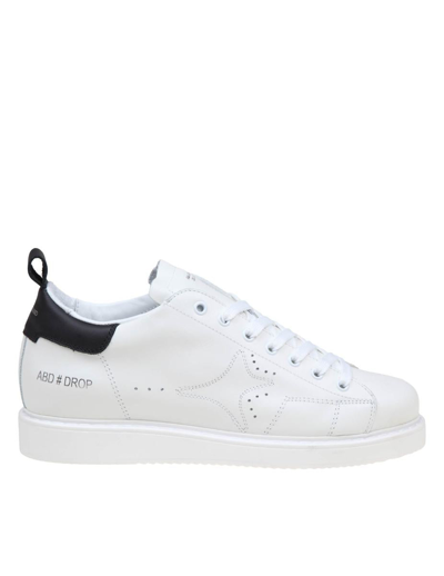 Ama Brand Leather Sneakers In White/black