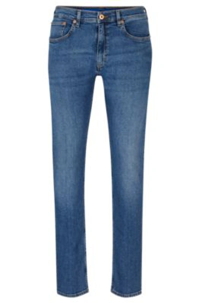 Hugo Extra-slim-fit Jeans In Navy Stonewashed Stretch Denim In Dark Blue