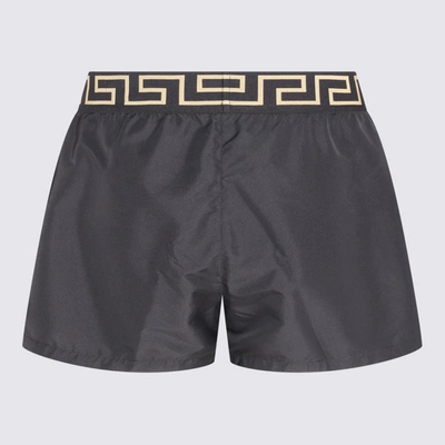 VERSACE VERSACE BLACK AND GOLD-TONE SWIM SHORTS