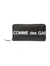 Comme Des Garçons Leather Pouch With Logo Print In Black