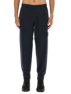Stone Island Elastic Waistband Regular Fit Ribbed Cuffs Side Pockets In Blue