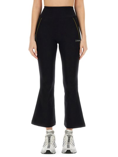 Versace Trousers With Logo In Black