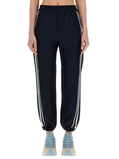 Moncler Embroidered Grosgrain-trimmed Jersey Tapered Track Pants In Blue