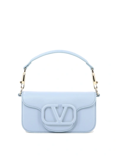 Valentino Garavani Small Locò Shoulder Bags Light Blue