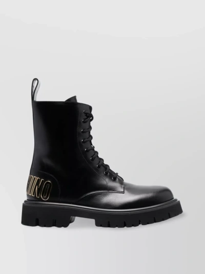 Moschino Logo-embossed Lace-up Boots In Black