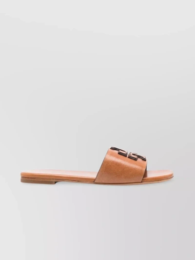 Tory Burch Embossed-logo Leather Slides In Brown
