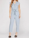 SHE + SKY SHORT SLEEVE BUTTON FRONT JUMPSUIT IN LIGHT BLUE