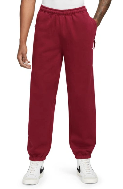 Nike Men's Solo Swoosh Fleece Pants In Red