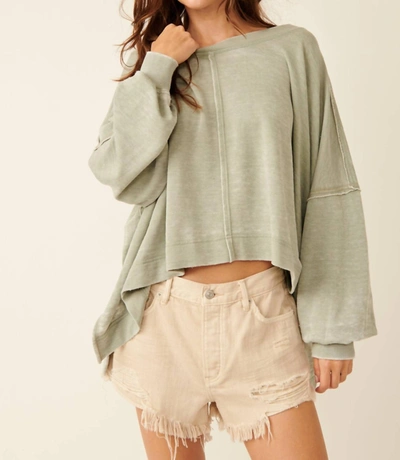 FREE PEOPLE DAISY SWEATSHIRT IN WASHED ARMY