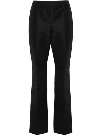 MOSCHINO MOSCHINO TROUSERS WITH PATCH DETAILS