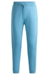 Hugo Boss Cotton-terry Tracksuit Bottoms With Logo Patch In Light Blue