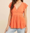 IN-LOOM HOLLY FLUTTER SLEEVE TIE-BACK TOP IN CORAL