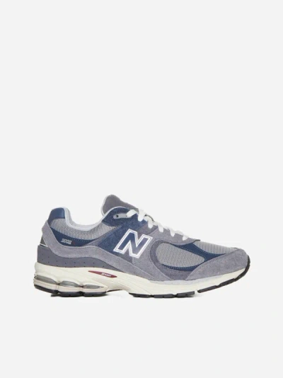 New Balance M2002r Trainers In Grey,blue