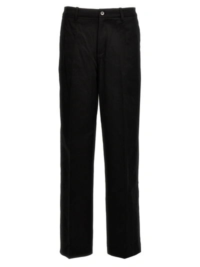 Axel Arigato Trousers In Black