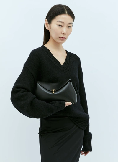 Totême T Lock Flap Leather Clutch Bag In Black