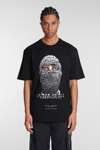 Ih Nom Uh Nit Graphic Mask Print Crewneck T-shirt In Black