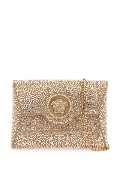 Versace Medusa Plaque Embellished Clutch Bag In Neutrals/gold