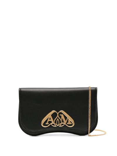 Alexander Mcqueen Seal-plaque Leather Clutch Bag In Black