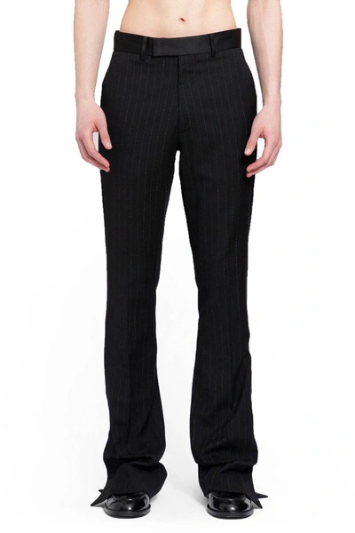 Amiri Trousers In Black