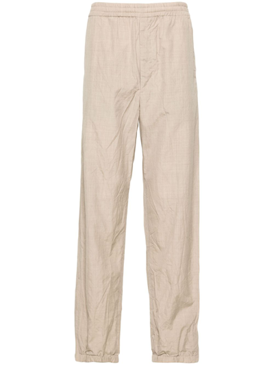 Auralee Tapered-leg Wool Trousers In Neutrals