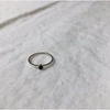 LINES & CURRENT ‘MONA’ RING WITH SMALL BLACK STONE
