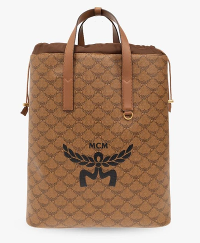 Mcm Medium Himmel Lauretos Monogrammed Backpack In Brown