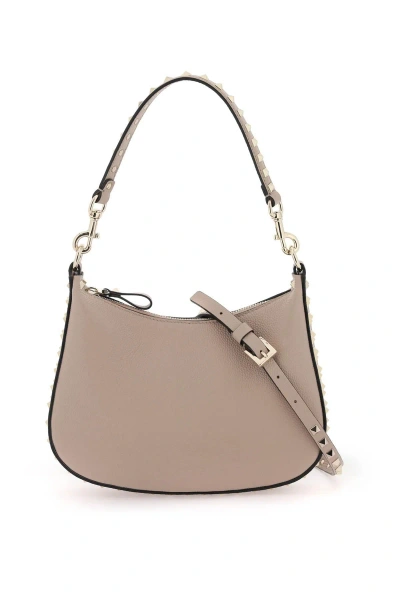 Valentino Garavani Rockstud Leather Small Hobo Bag In Pink,grey