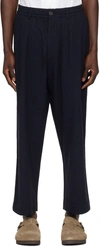 UNIVERSAL WORKS NAVY OXFORD TROUSERS