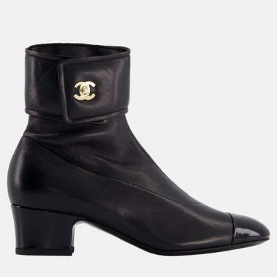 Pre-owned Chanel Black Leather Ankle Boots With Patent Toe And Champagne Gold Cc Logo Detail Size Eu 35.5
