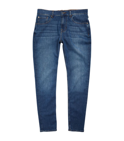 7 For All Mankind Slimmy Tapered Jeans In Navy