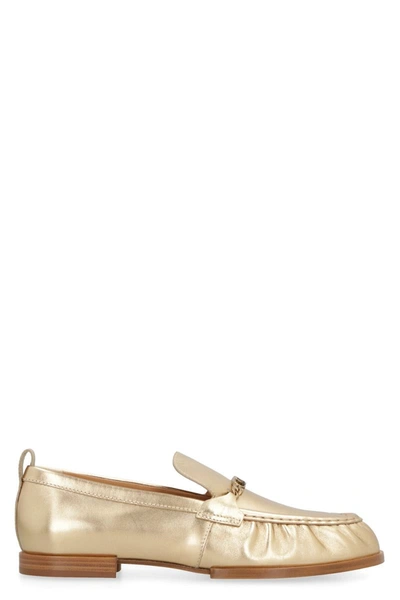 Tod's Gommini Metallic Textured-leather Loafers In Gold