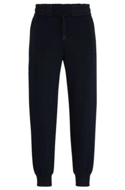 Hugo Boss Tracksuit Bottoms With Mesh Trims In Dark Blue