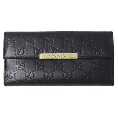 Gucci Black Leather Wallet  ()