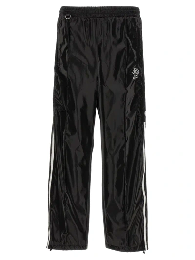 Doublet Laminate Track Trousers In Black