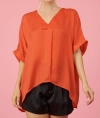 GLAM V-NECK HIGH-LOW TOP IN ORANGE