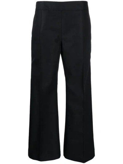 Studio Nicholson Acapulco Low-rise Trousers In Black