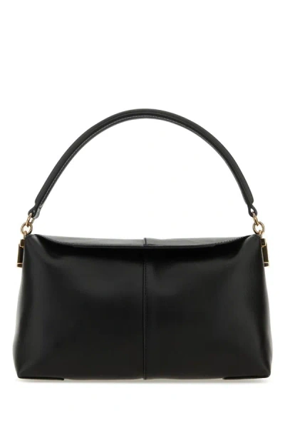 Tod's Handbags. In Black