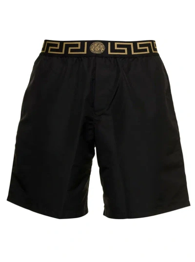 Versace Beach Bermuda Shorts With Logo And Greca Motif In Black Nylon Man