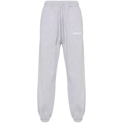 Cole Buxton Logo-print Jersey Trousers In Grey