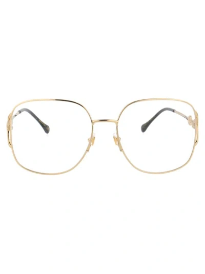 Gucci Gg1019o Glasses In 001 Gold Gold Transparent