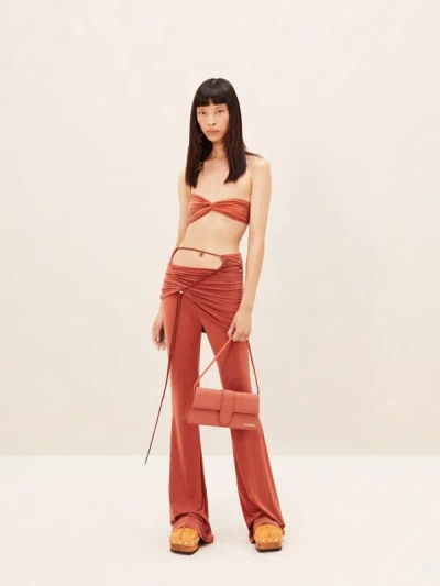 Jacquemus Espelho Draped Flared Trousers In Orange