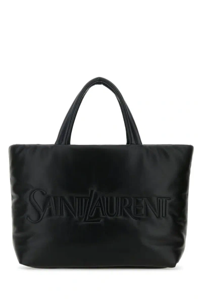 Saint Laurent Handbags. In Gold