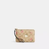 Coach Outlet Corner Zip Wristlet In Signature Canvas With Floral Print In Multi