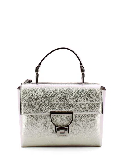 Coccinelle Bags.. Silver