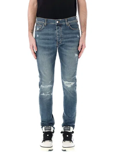 Amiri Distressed Skinny Jeans In Blue