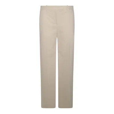 The Row Flared Tailored Trousers In Sand