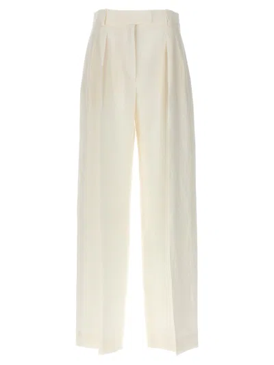 The Row Antone Pleated Wide-leg Trousers In Ivory