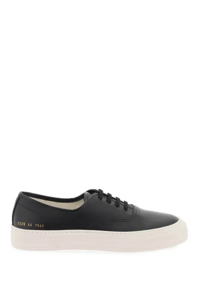 Common Projects Trainers In Pelle Martellata In Black