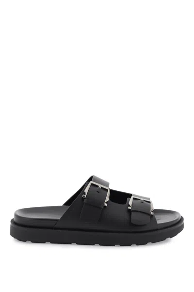 Ferragamo Slides With Gancini Buckles In Black