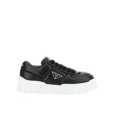 Prada Logo Leather Sneaker In Black